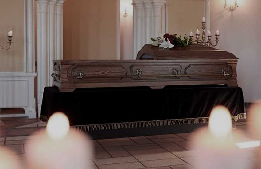 Funeral pall on a catafalque with a coffin